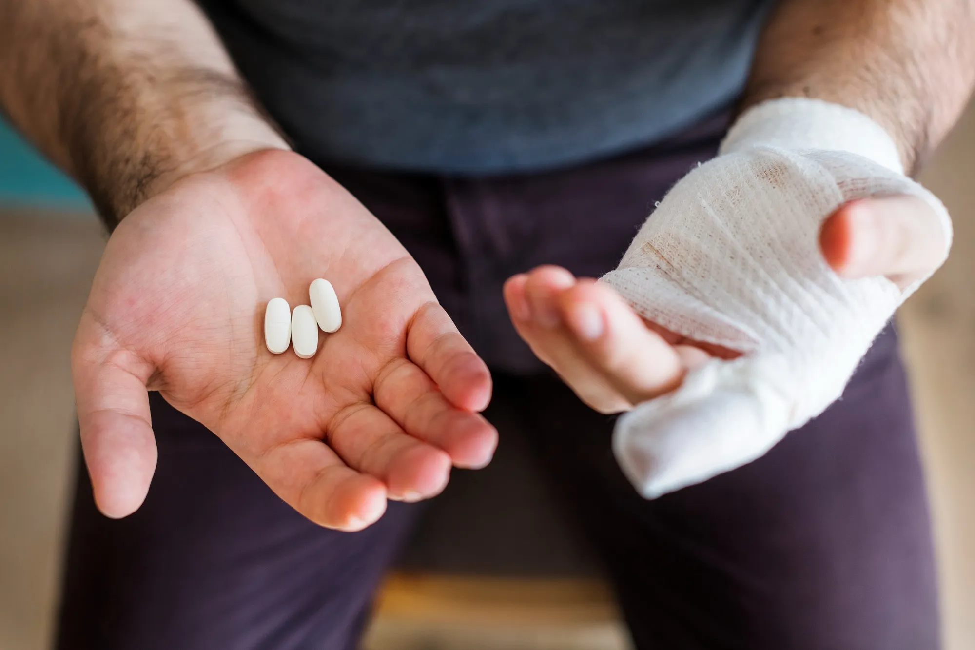 Patient taking medication to support Quick Wound Healing Medicines for injury recovery.