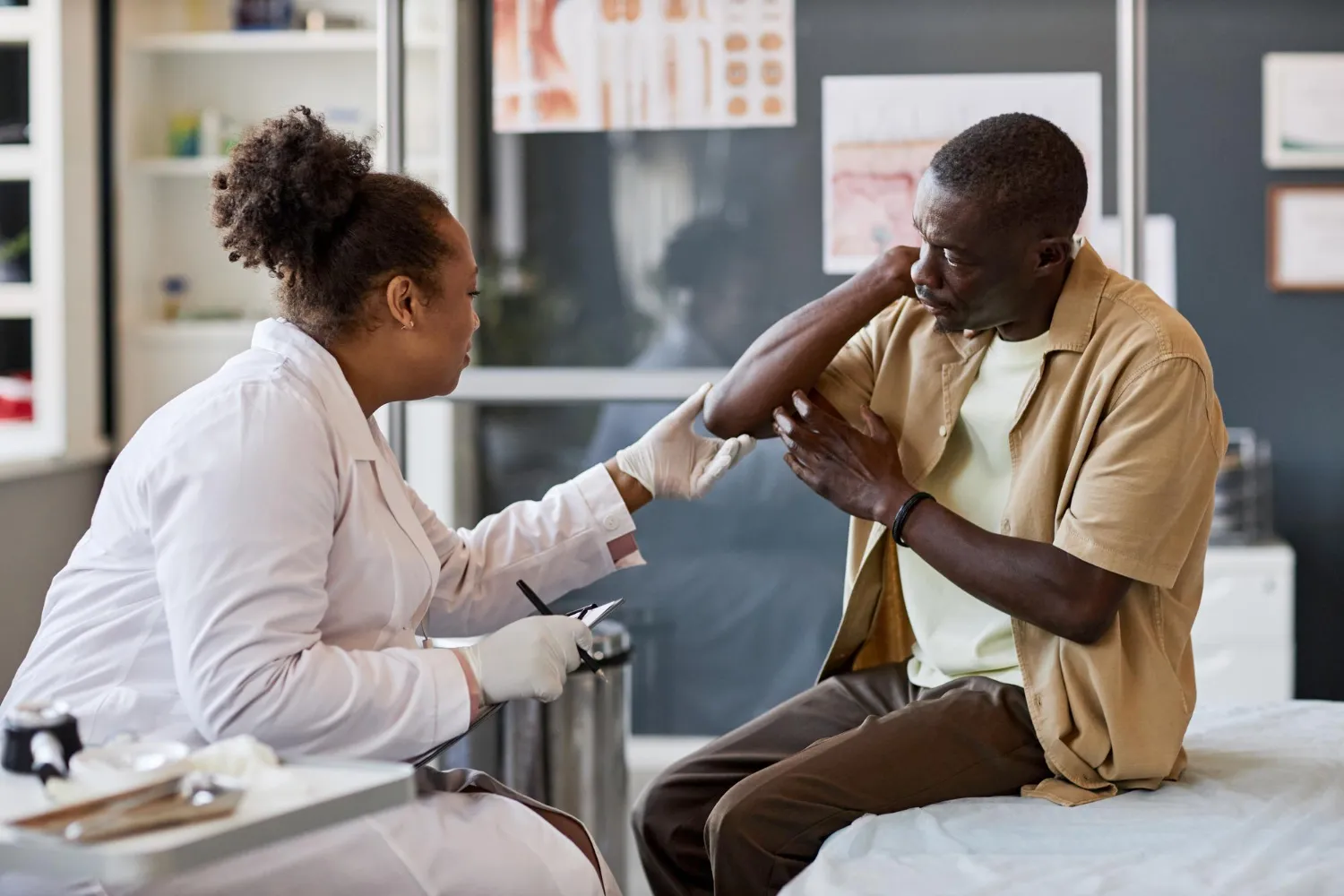 Healthcare professional treating a leg injury with Wound Care Treatment.