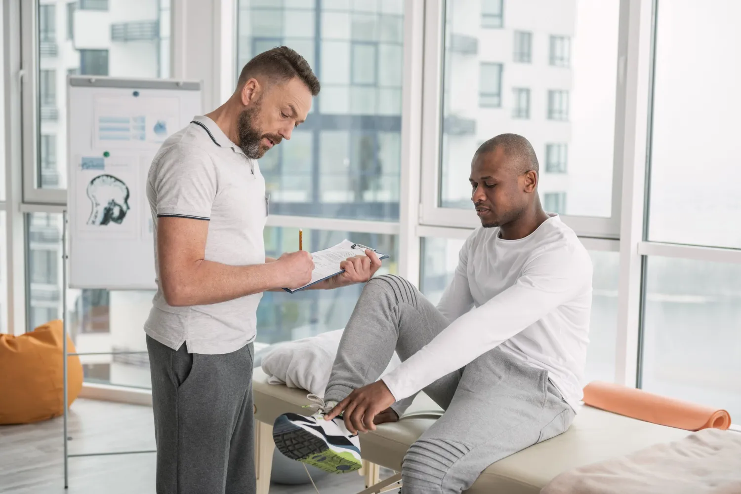 Healthcare professional guiding a patient through assisted movement during Jacksonville Injury Claims Assistance.