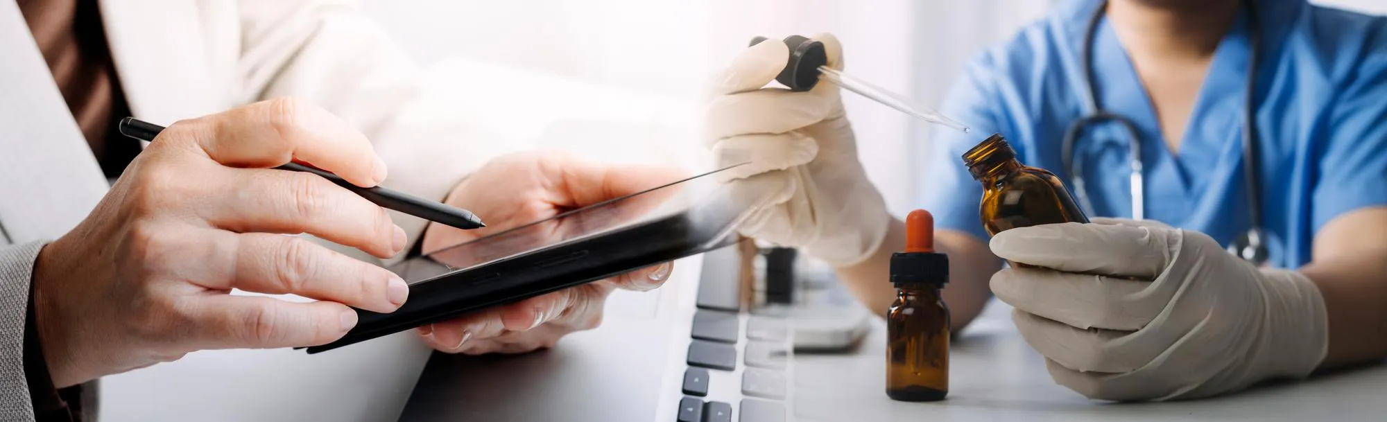 Compounding pharmacy professionals preparing customized medications and reviewing digital prescription management solutions