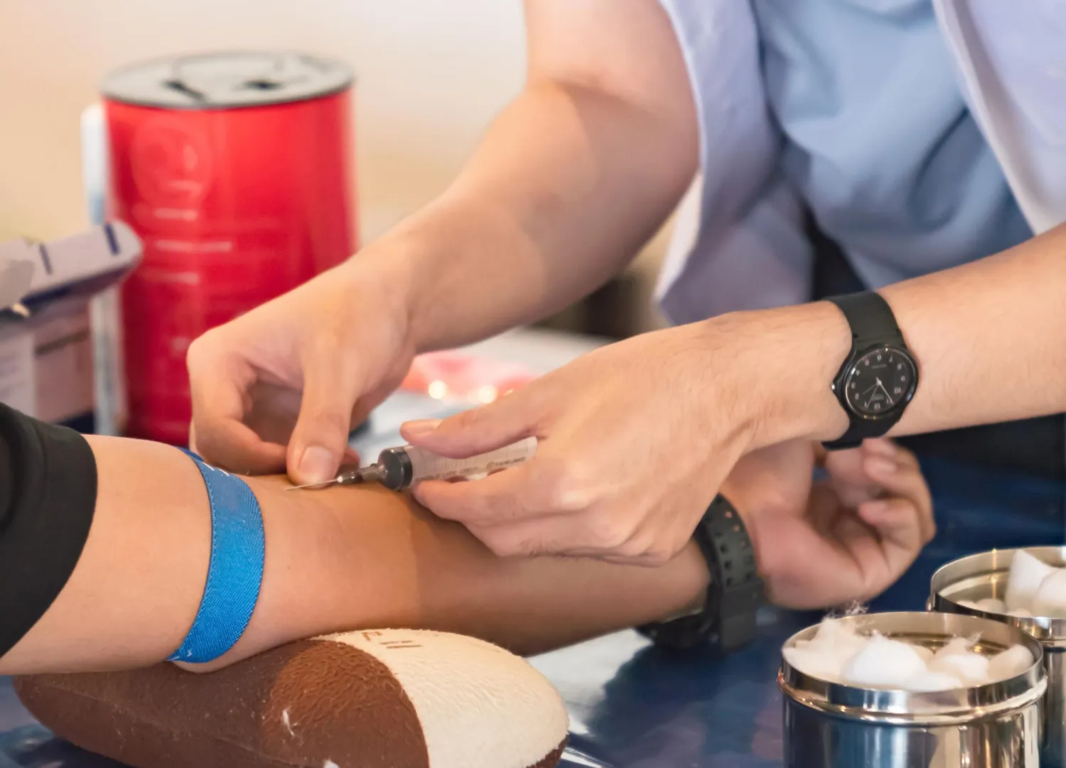 Healthcare professional administering injection for quick wound healing treatment and medication therapy
