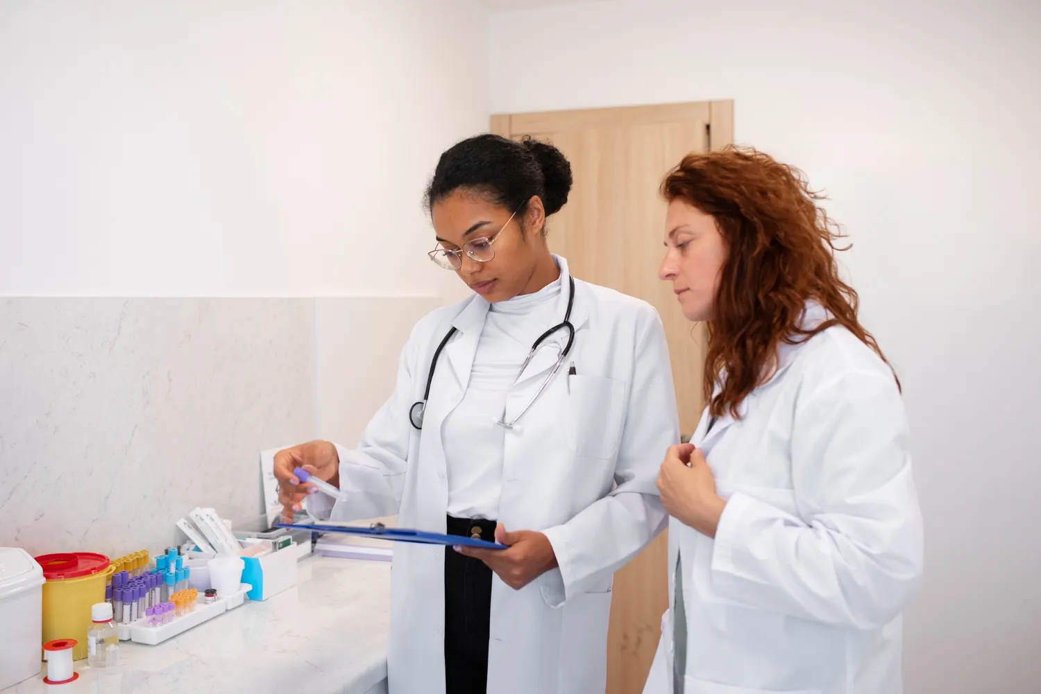 Injury care pharmacy professionals reviewing prescriptions and treatment plans for personalized patient recovery support