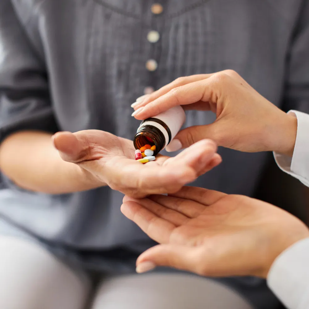 Mental health professionals in Jacksonville assisting patient with personalized medications for mental wellness and behavioral health support