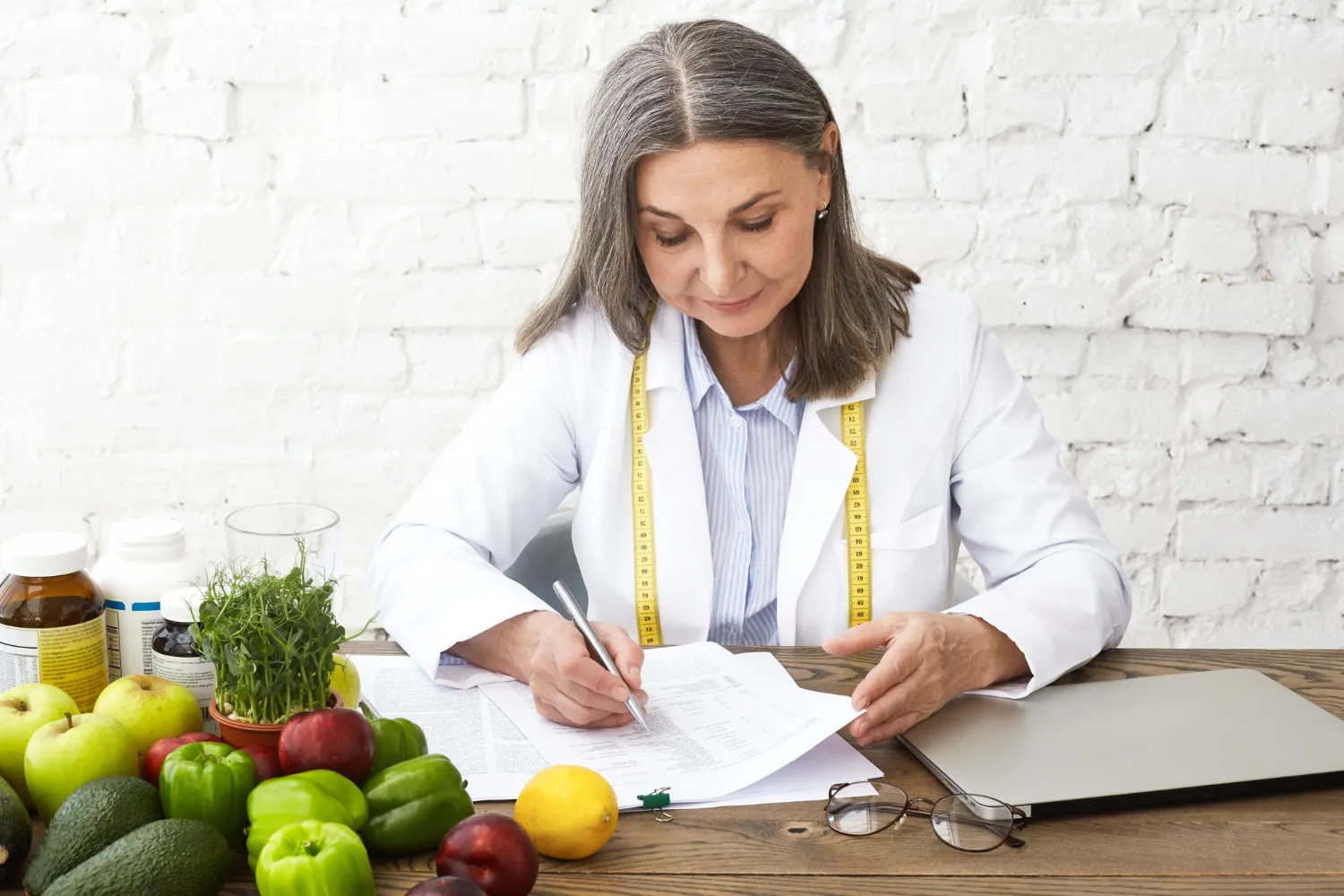 Healthcare provider reviewing Naltrexone weight loss Jacksonville treatment plan with nutrition recommendations and patient progress tracking
