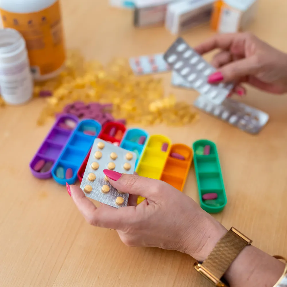 Pediatric compounding pharmacy preparing customized medication doses using organized pill packaging and accurate dosage management for children
