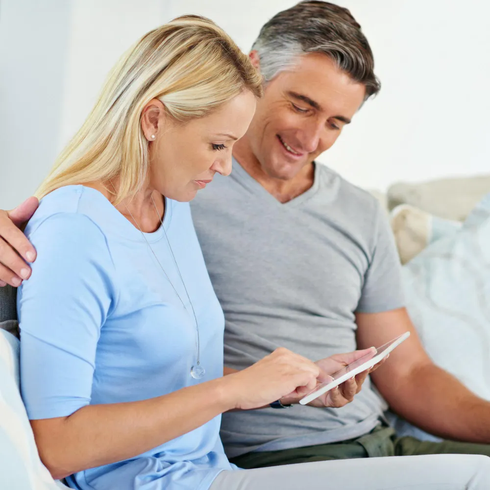 Couple reviewing hormone therapy Jacksonville treatment options for personalized hormone health and HRT Jacksonville care.