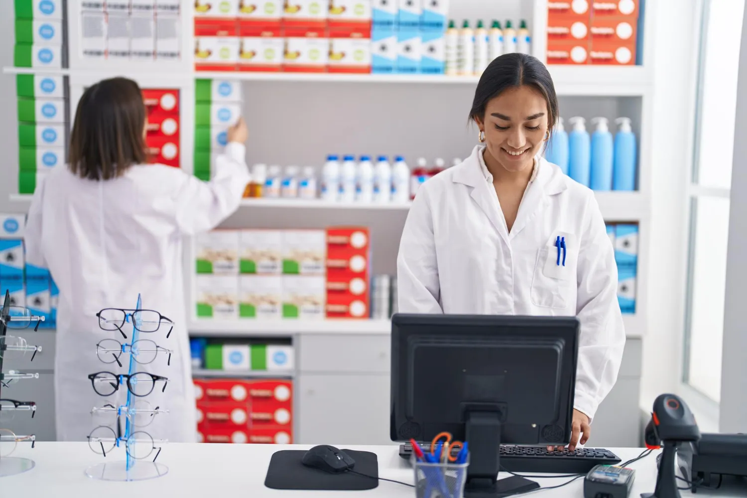 Pharmacist preparing medications in a compounding pharmacy Jacksonville FL.
